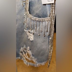 Distressed denim and rhinestone shorts